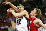 RALEIGH, NC - MARCH 21:  Micah Downs #22 of the Gonzaga Bulldogs grabs a rebound against Thomas Sander #15 of the Davidson Wildcats during the 1st round of the 2008 NCAA Men's Basketball Tournament on March 21, 2008 at RBC Center in Raleigh, North Carolina.  (Photo by Kevin C. Cox/Getty Images)