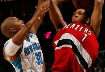 NEW ORLEANS - NOVEMBER 14:  Brandon Roy #7 of the  Portland Trail Blazers makes a shot over David West #30 of the New Orleans Hornets at the New Orleans Arena on November 14, 2008 in New Orleans, Louisiana.  The Hornets defeated the Trail Blazers 87-82.  NOTE TO USER: User expressly acknowledges and agrees that, by downloading and/or using this Photograph, user is consenting to the terms and conditions of the Getty Images License Agreement.  (Photo by Chris Graythen/Getty Images)
