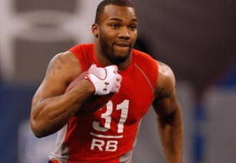 INDIANAPOLIS, IN - FEBRUARY 22:  Running back Beanie Wells of Ohio State runs with the football during the NFL Scouting Combine presented by Under Armour at Lucas Oil Stadium on February 22, 2009 in Indianapolis, Indiana. (Photo by Scott Boehm/Getty Images)