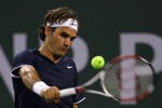 INDIAN WELLS, CA - MARCH 19: Roger Federer of Switzerland returns a backhand to Fernando Verdasco during the BNP Paribas Open at the Indian Wells Tennis Garden on March 19, 2009 in Indian Wells, California.  (Photo by Jeff Gross/Getty Images)