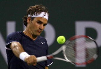 INDIAN WELLS, CA - MARCH 19: Roger Federer of Switzerland returns a backhand to Fernando Verdasco during the BNP Paribas Open at the Indian Wells Tennis Garden on March 19, 2009 in Indian Wells, California.  (Photo by Jeff Gross/Getty Images)