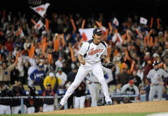 LOS ANGELES - MARCH 22: Pitcher Yu Darvish #11 of Japan during celebrates after striking out Adam Dunn #17 of the United States to win the semifinal game of the 2009 World Baseball Classic on March 22, 2009 at Dodger Stadium in Los Angeles, California. Japan defeated the United States 9-4. (Photo by Kevork Djansezian/Getty Images)