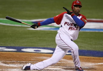 SAN JUAN, PUERTO RICO - MARCH 09:  Bernie Williams #51 of Puerto Rico swings the bat against The Netherlands during the 2009 World Baseball Classic Pool D match on March 9, 2009 at Hiram Bithorn Stadium in San Juan, Puerto Rico.  (Photo by Al Bello/Getty Images)