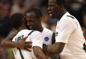 MINNEAPOLIS - MARCH 22:  (L-R) Kalin Lucas #1, Travis Walton #5 and Draymond Green #23 of the Michigan State Spartans celebrate after their 74-69 win against the USC Trojans during the second round of the NCAA Division I Men's Basketball Tournament at the Hubert H. Humphrey Metrodome on March 22, 2009 in Minneapolis, Minnesota.  (Photo by Jonathan Daniel/Getty Images)