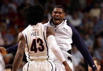 MIAMI - MARCH 22: Forward Jordan Hill #43 of the  University of Arizona Wildcats celebrates with a teammate during a time out in their game against the Cleveland State University Vikings during the second round of the NCAA Division I Men's Basketball Tournament at the American Airlines Arena on March 22, 2009 in Miami, Florida.  (Photo by Marc Serota/Getty Images)
