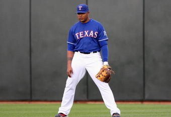 SURPRISE, AZ - MARCH 05:  Andruw Jones #25 of the Texas Rangers stands in center field during the spring training game against the San Diego Padres at Surprise Stadium on March 5, 2009 in Surprise, Arizona. The Rangers defeated the Padres 4-3.  (Photo by Christian Petersen/Getty Images)