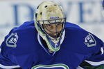 VANCOUVER, CANADA - MARCH 7: Roberto Luongo #1 of the Vancouver Canucks looks on during pregame warmups before the game against the San Jose Sharks on March 7, 2009 at General Motors Place in Vancouver, Canada.   (Photo by Nick Didlick/Getty Images)