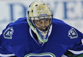 VANCOUVER, CANADA - MARCH 7: Roberto Luongo #1 of the Vancouver Canucks looks on during pregame warmups before the game against the San Jose Sharks on March 7, 2009 at General Motors Place in Vancouver, Canada.   (Photo by Nick Didlick/Getty Images)
