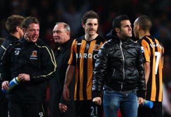LONDON - MARCH 17: Brian Horton (3rd L), assistant manager of Hull, looks on as Cesc Fabregas comes onto the pitch after the the FA Cup Sponsored by E.on sixth round match between Arsenal and Hull City at Emirates Stadium on March 17, 2009 in London, England. (Photo by Ryan Pierse/Getty Images)