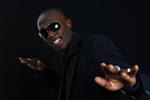 MONTE CARLO, MONACO - NOVEMBER 23:  Usain Bolt of Jamaica strikes a pose after receiving the Men's World Athlete of the Year Award during the IAAF World Athletics Gala at the Hotel on November 23, 2008 in Monte Carlo, Monaco.  (Photo by Julian Finney/Getty Images)