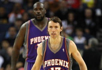 OAKLAND, CA - MARCH 15:  Steve Nash #13 and Shaquille O'Neal #32 of the Phoenix Suns look on against the Golden State Warriors during an NBA game on March 15, 2009 at Oracle Arena in Oakland, California. NOTE TO USER: User expressly acknowledges and agrees that, by downloading and or using this photograph, User is consenting to the terms and conditions of the Getty Images License Agreement.  (Photo by Jed Jacobsohn/Getty Images)