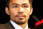 LAS VEGAS - DECEMBER 06:  Manny Pacquiao of the Philippines speaks at a news conference following his victory over Oscar De La Hoya in their welterweight bout at the MGM Grand Garden Arena December 6, 2008 in Las Vegas, Nevada.  (Photo by Ethan Miller/Getty Images)