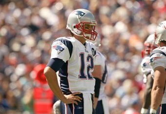 FOXBORO, MA - SEPTEMBER 7:  Quarterback #12 of the New England Patriots looks on during their NFL game against the Kansas City Chiefs on September 7, 2008 at Gillette Stadium in Foxboro, Massachusetts. The Patriots defeated the Chiefs 17-10. (Photo by Elsa Garrison/Getty Images)