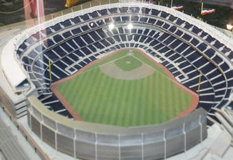 NEW YORK - JULY 11:  Fans look at a model of the New Yankee Stadium that will open in the spring of 2009 at the DHL All-Star Fan Fest for the Major League Baseball 2008 All-Star Game July 11, 2008 at the Jacob K. Javits Convention Center in New York City.   (Photo by Mike Stobe/Getty Images)