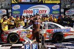 BRISTOL, TN - MARCH 22:  Kyle Busch, driver of the #18 Snickers Toyota, poses in victory lane after winning the NASCAR Sprint Cup Series Food City 500 at Bristol Motor Speedway on March 22, 2009 in Bristol, Tennessee.  (Photo by John Harrelson/Getty Images)