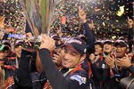 LOS ANGELES, CA - MARCH 23:  Ichiro Suzuki #51 of Japan holds up the championship trophy after defeating Korea during the finals of the 2009 World Baseball Classic on March 23, 2009 at Dodger Stadium in Los Angeles, California. Japan won 5-3 in 10 innings. (Photo by Mark J. Terrill-Pool/Getty Images)
