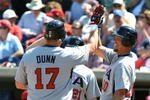 DUNEDIN, FL - MARCH 5:  Outfielder Adam Dunn #17 of Team USA celebrates a three-run home run against the Philadelphia Phillies March 5, 2009 at Bright House Field in Dunedin, Florida.  (Photo by Al Messerschmidt/Getty Images)