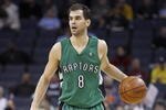 CHARLOTTE, NC - MARCH 16:  Jose Calderon #8 of the Toronto Raptors dribbles downcourt against the Charlotte Bobcats during their game at Time Warner Cable Arena on March 16, 2009 in Charlotte, North Carolina.  NOTE TO USER: User expressly acknowledges and agrees that, by downloading and/or using this Photograph, user is consenting to the terms and conditions of the Getty Images License Agreement. (Photo by: Streeter Lecka/Getty Images)