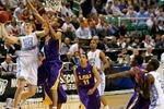 GREENSBORO, NC - MARCH 21:  Tyler Hansbrough #50 of the North Carolina Tar Heels shoots against Chris Johnson #21 of the Louisiana State University Tigers during the second round of the NCAA Division I Men's Basketball Tournament at the Greensboro Coliseum on March 21, 2009 in Greensboro, North Carolina.  (Photo by Streeter Lecka/Getty Images)