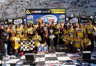 BRISTOL, TN - MARCH 22:  Kyle Busch Driver of the #18 Snickers Toyota celebrates in Victory Lane with his crew after winning the NASCAR Sprint Cup Series Food City 500 at Bristol Motor Speedway on March 22, 2009 in Bristol, Tennessee.  (Photo by John Harrelson/Getty Images)