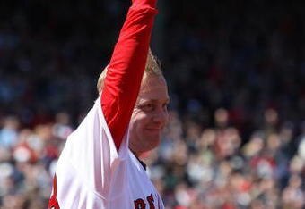 BOSTON - APRIL 08:  Curt Schilling #38 of the Boston Red Sox  heads out on to the field to get his 2007 World Series Championship Ring before the game the Detroit Tigers on April 8,2008 during Opening Day at Fenway Park in Boston, Massachusetts.  (Photo by Elsa/Getty Images)