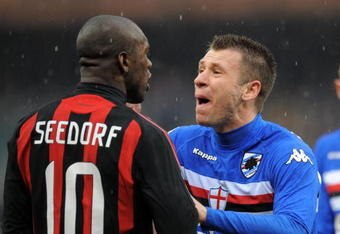 GENOVA, ITALY - MARCH 01: Antonio Cassano of Sampdoria confronts Clarence Seedorf of Milan during the Serie A match between Sampdoria and Milan at the Stadio Marassi on March 01, 2009 in Geneva, Italy. (Photo by New Press/Getty Images)