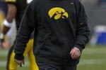 IOWA CITY, IOWA - NOVEMBER 8: Head Coach Kirk Ferentz of the Iowa Hawkeyes runs his team through warm up drills before taking on the  Penn State Nittany Lions at Kinnick Stadium on November 8, 2008 in Iowa City, Iowa. Iowa defeated Penn State  24-23. (Photo by David Purdy/Getty Images)
