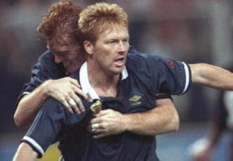 16 Jun 1990:  Mo Johnstone (front) and Alex McLeish (behind) of Scotland celebrate their win during the World Cup match against Sweden in Genoa, Italy. Scotland won the match 2-1. \ Mandatory Credit: Simon  Bruty/Allsport