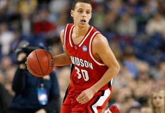 DETROIT - MARCH 30:  Stephen Curry #30 of the Davidson Wildcats brings the ball up court against the Kansas Jayhawks during the Midwest Regional Final of the 2008 NCAA Division I Men's Basketball Tournament at Ford Field on March 30, 2008 in Detroit, Michigan. Kansas won 59-57.  (Photo by Gregory Shamus/Getty Images)