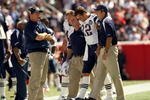 FOXBORO, MA - SEPTEMBER 7:  Quarterback Tom Brady #12 of the New England Patriots walks off the field with the aid of the Patriots staff after being injured on a play during their NFL game against the Kansas City Chiefs on September 7, 2008 at Gillette Stadium in Foxboro, Massachusetts. The Patriots defeated the Chiefs 17-10. (Photo by Elsa Garrison/Getty Images)