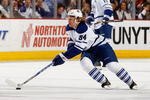 BUFFALO, NY - DECEMBER 12:  Mikhail Grabovski #84 of the Toronto Maple Leafs skates with the puck during the game against the Buffalo Sabres on December 12, 2008 at HSBC Arena in Buffalo, New York. (Photo by Rick Stewart/Getty Images)
