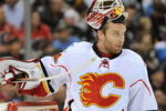 PITTSBURGH - MARCH 25:  Goaltender Miikka Kiprusoff #34 of the Calgary Flames takes a break in a game against the Pittsburgh Penguins on March 25, 2009 at Mellon Arena in Pittsburgh, Pennsylvania.  (Photo by Jamie Sabau/Getty Images)