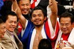 LAS VEGAS - DECEMBER 06:  Manny Pacquiao of the Philippines celebrates after defeating Oscar De La Hoya in their welterweight fight at the MGM Grand Garden Arena December 6, 2008 in Las Vegas, Nevada.  (Photo by Ethan Miller/Getty Images)
