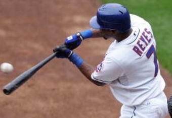 NEW YORK - SEPTEMBER 27:  Jose Reyes #7 of the New York Mets connects for a first inning base hit against the Florida Marlins on September 27, 2008 at Shea Stadium in the Flushing neighborhood of the Queens borough of New York City.  (Photo by Jim McIsaac/Getty Images)