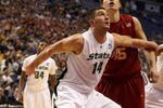 MINNEAPOLIS - MARCH 22:  Goran Suton #14 of the Michigan State Spartans fights for position under the basket against Nikola Vucevic #5 of the USC Trojans during the second round of the NCAA Division I Men's Basketball Tournament at the Hubert H. Humphrey Metrodome on March 22, 2009 in Minneapolis, Minnesota. Michigan State won 74-69. (Photo by Jonathan Daniel/Getty Images)