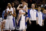 BOSTON - MARCH 26:  The Duke Blue Devils sit dejected on their bench after losing to the Villanova Wildcats during the NCAA Men's Basketball Tournament East Regionals at TD Banknorth Garden on March 26, 2009 in Boston, Massachusetts.  (Photo by Elsa/Getty Images)