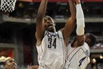 GLENDALE, AZ - MARCH 26:  Center Hasheem Thabeet #34 of the Connenticut Huskies grabs a rebound against the Purdue Boilermakers in the Sweet 16 of the NCAA Division I Men's Basketball Tournament at the University of Phoenix Stadium on March 26, 2009 in Glendale, Arizona.  (Photo by Ronald Martinez/Getty Images)