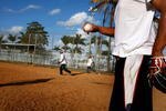 MIAMI - MARCH 24:  People play a baseball game adjacent to an empty lot behind them where the new home of Major League Baseball's Florida Marlins will be built March 24, 2009 in Miami, Florida. Miami-Dade County Commissioners last week approved financing plans for the $634 million, 37,000-seat stadium, which features a retractable roof, on the site where the Orange Bowl once stood.   (Photo by Joe Raedle/Getty Images)