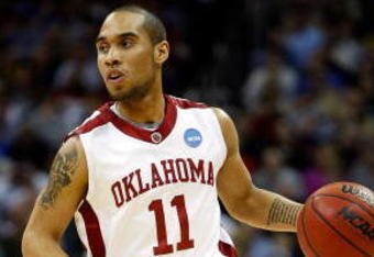 KANSAS CITY, MO - MARCH 21:   Omar Leary #11 of the Oklahoma Sooners dribbles the ball against the Michigan Wolverines during the second round of the NCAA Division I Men's Basketball Tournament at the Sprint Center on March 21, 2009 in Kansas City, Missouri. The Sooners defeated the Wolverines 73-63.  (Photo by Jamie Squire/Getty Images)