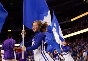 TAMPA, FL - MARCH 13:  Cheerleaders of the Kentucky Wildcats cheer before the game against the Louisiana State University Tigers during the second round of the SEC Men's Basketball Tournament on March 13, 2009 at The St. Pete Times Forum in Tampa, Florida.  (Photo by Chris Graythen/Getty Images)