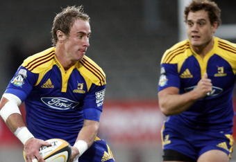 DUNEDIN, NEW ZEALAND - MARCH 21:  Jimmy Cowan and Israel Dagg of the Highlanders make a break during the round six Super 14 match between the Highlanders and the Cheetahs at Carisbrook on March 21, 2009 in Dunedin, New Zealand.  (Photo by Martin Hunter/Getty Images)