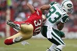 SAN FRANCISCO - DECEMBER 07: Chansi Stuckey #83 of the New York Jets catches a pass against Donald Strickland #30 of the San Francisco 49ers during an NFL game on December 7, 2008 at Candlestick Park in San Francisco, California.  (Photo by Jed Jacobsohn/Getty Images)