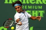 KEY BISCAYNE, FL - MARCH 27:  Roger Federer of Switzerland returns a shot against Kevin Kim during day five of the Sony Ericsson Open at the Crandon Park Tennis Center on March 27, 2009 in Key Biscayne, Florida.  (Photo by Al Bello/Getty Images)