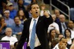 KANSAS CITY, MO - MARCH 21:  Head Coach John Calipari of the Memphis Tigers points a finger from the sideline during their second round game against the Maryland Terrapins in the NCAA Division I Men's Basketball Tournament at the Sprint Center on March 21, 2009 in Kansas City, Missouri. The Tigers defeated the Terrapins 89-70.  (Photo by Jamie Squire/Getty Images)