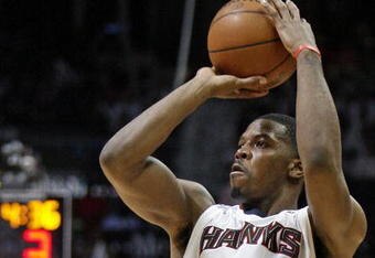 ATLANTA - APRIL 28: Guard Joe Johnson #2 of the Atlanta Hawks makes a three point attempt in the fourth quarter of Game Four of the Eastern Conference Quarterfinals against the Boston Celtics during the 2008 NBA Playoffs at the Philips Arena on April 28, 2008 in Atlanta, Georgia. The Hawks beat the Celtics 97-92 to tie the best-of-7 series at 2-2.  NOTE TO USER: User expressly acknowledges and agrees that, by downloading and or using this photograph, User is consenting to the terms and conditions of the Getty Images License Agreement. (Photo by Mike Zarrilli/Getty Images)