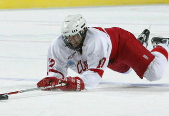 ST. LOUIS - APRIL 10:  Matt McRae #17 of Cornell trips on in the third period against New Hampshire during the NCAA Frozen Four match at the HSBC Arena on April 10, 2003 in Buffalo, New York. New Hampshire won 3-2 to advance to the championship game. (Photo by Elsa/Getty Images)