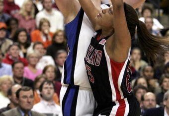 BOSTON - APRIL 04:  Alison Bales #43 of Duke loses the ball to Marissa Coleman #25 of Maryland during the 2006 NCAA Women's Basketball Championship Game on April 4, 2006 at the TD Banknorth Garden in Boston, Massachusetts. The Maryland Terrapins defeated the Duke Blue Devils 78-75.  (Photo by Elsa/Getty Images)