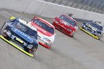 NASHVILLE, TN - AUGUST 12:  Frank Kimmel, driver of the #46 Pork The Other White Meat-Mighty EZY Ford, leads a group of cars during the ARCA RE/MAX 200 on August 12, 2006 at the Nashville Superspeedway in Nashville, Tennessee.  (Photo by Chris Graythen/Getty Images for NASCAR)