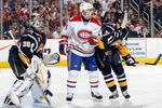 BUFFALO - OCTOBER 10:  Tomas Plekanec #14 of the Montreal Canadiens skates into position against goalie Ryan Miller #30 and Toni Lydman #5 of the Buffalo Sabres at HSBC Arena on October 10, 2008 in Buffalo, New York. (Photo by: Rick Stewart/Getty Images)
