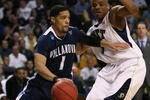 BOSTON - MARCH 28:  Scottie Reynolds #1 of the Villanova Wildcats drives past Tyrell Biggs #5 of the Pittsburgh Panthers during the NCAA Men's Basketball Tournament East Regionals at TD Banknorth Garden on March 28, 2009 in Boston, Massachusetts.  (Photo by Elsa/Getty Images)